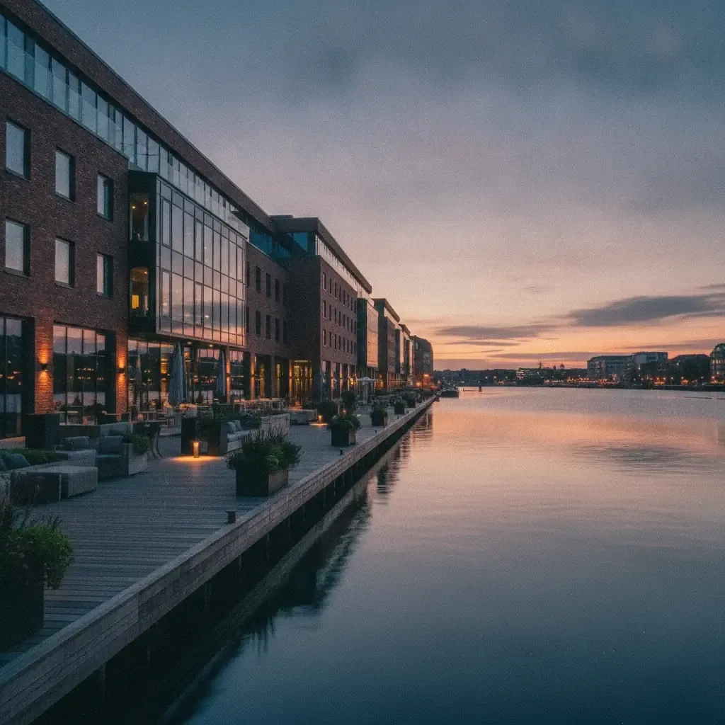 Editorial waterfront hotel along a Danish fjord city
